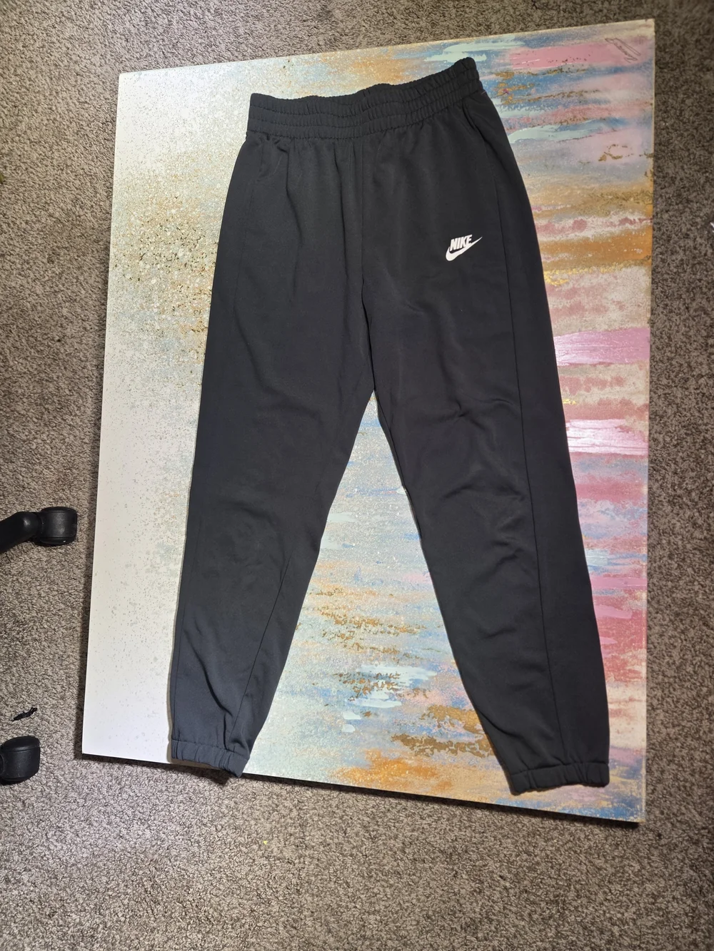 Nike Kids Black Jogger Sweatpants with White Swoosh